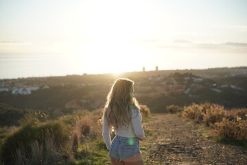 woman walking on the road