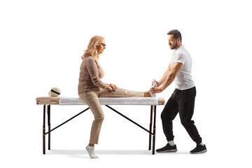 Obraz premium Therapist giving a foot massage to a woman