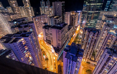 Aerial Rooftop View of Modern Contemporary Hong Kong Skyline at Night in Tai Koo, Hong Kong