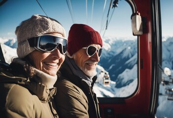 Happy skier senior couple looking at the window of cable car during mountain vacation in winter