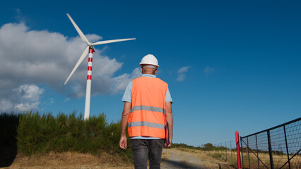Architect checks the correct functioning of wind turbines