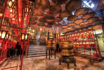 Naklejka premium Traditional Chinese Temple with Lanterns, Incense and Pilgrims, Man Mo Temple, Hong Kong