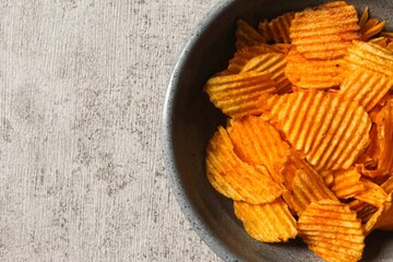 chips in a bowl with negative space