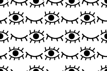 Cute cartoon eyes black outlines on the white background. Seamless vector pattern for design and decoration.