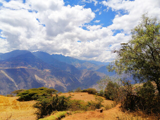 mountain, landscape, nature, mountains, sky, hill, tree, valley, countryside, forest, grass, green, panorama, rural, view, park, cloud, meadow, summer, field, hills, road, travel, clouds, rock
