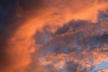 Clouds and blue sky. Evening sky, sunset with red clouds