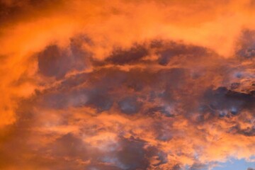 Obraz premium Clouds and blue sky. Evening sky, sunset with red clouds