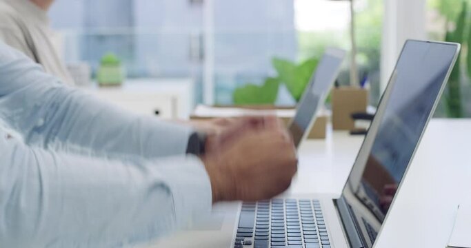 Angry businessman, hands and hitting laptop in debt, loss or failure on office desk. Closeup of man typing computer in anger management, mistake or destruction of equipment on table at workplace