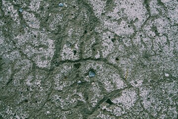 Texture of a stone wall with cracks, background image
