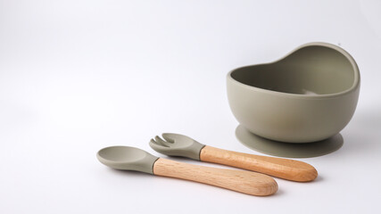 Set of silicone dishware for baby. First baby food concept, serving food for kids