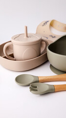 Set of silicone dishware for baby. First baby food concept, serving food for kids