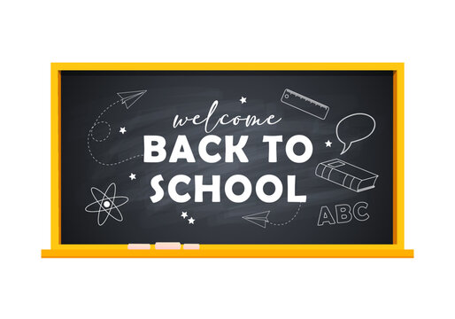 Blackboard with lettering welcome back to school and different chalk pictures
