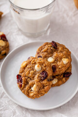 Cranberry and white chocolate cookies served with milk