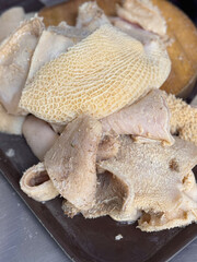 beef tripe on cutting board
