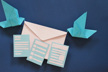 Two birds paper origami carrying letter envelope. Receiving email such as newsletter, survey and...