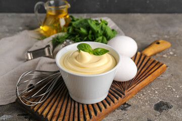 Bowl of fresh mayonnaise on table
