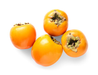 Fresh ripe persimmons on white background