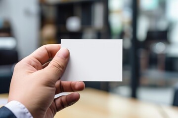 Male hand holding a blank business card. Generative AI.