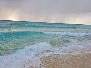Beautiful crystal clear water in the Caribbean Sea in a cloudy day… Canacun, Mexico