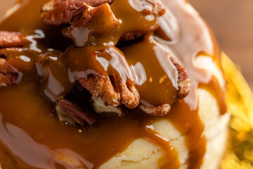 Caramel and pecan topped ice cream