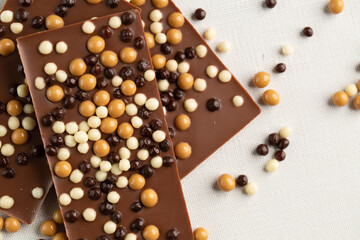 Chocolate topped with chocolate balls