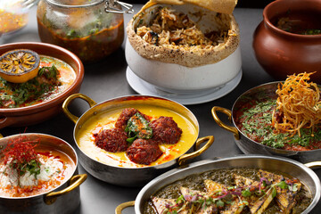 Table full of Indian dishes