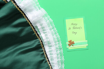 Skirt with festive card on green background. St. Patrick's Day celebration