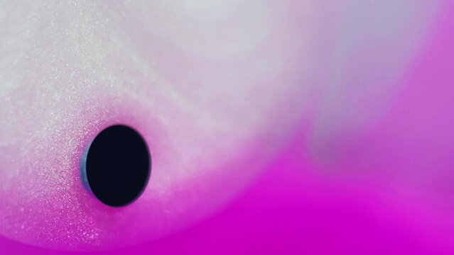 Glitter fluid drop. Paint water flow. Magenta pink white color gradient shimmering texture paint bubble black ink blob motion abstract background.