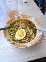 Soto is a food made from broth and vegetables, not forgetting the topping of boiled egg and koya, this soto is one of the many soto variants in Indonesia.