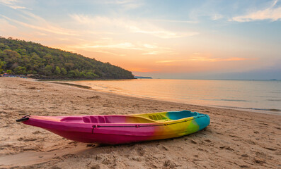 Beautiful summer beach and sea and yellow orange sky at the sunset, twilight period which including...