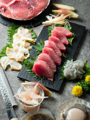 Raw tuna, raw scallops, and various seafood