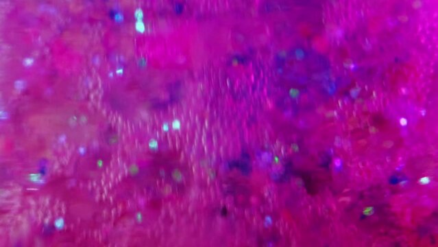 Color foam texture. Gel bubbles. Paint water. Defocused pink blue purple glitter soap fizz fluid ink floating art abstract background.