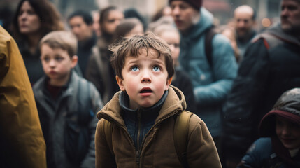 Wide-Eyed Toddler in a Brown Jacket Looking Upward with Awe on a Busy Urban Street