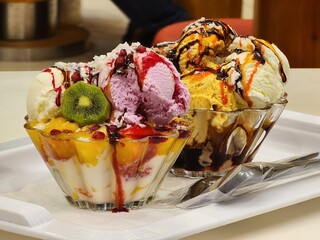 Fruits salad with ice cream meal 