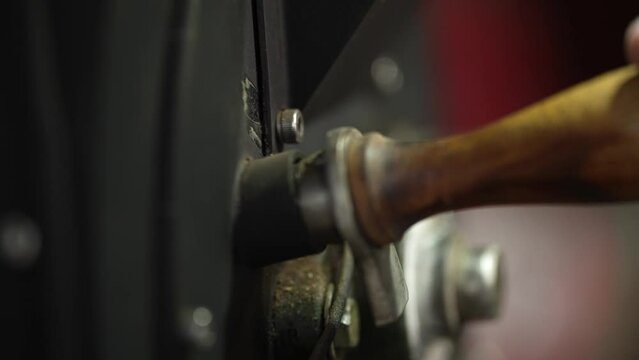 someone is observing the maturity level of coffee