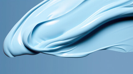 Blue liquid in close-up shot on blue background. Perfect for science or technology related projects
