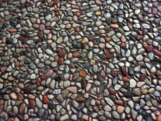 Floor with colourful pebble stone texture decorative.