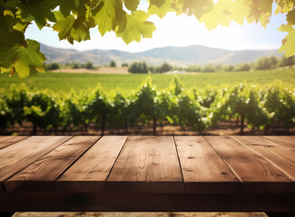 The empty wooden brown tabletop with vineyards and beautiful scenery of mountain and hills with...
