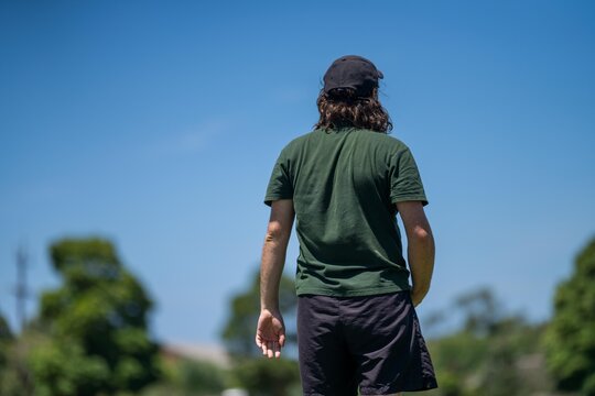 playing a game on a green over for health and recreation in australia in summer