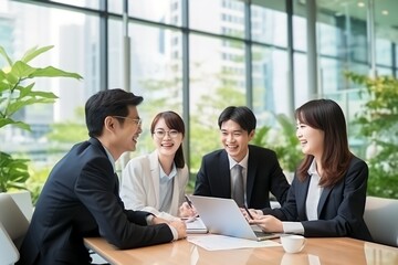Group of Chinese people working at the office