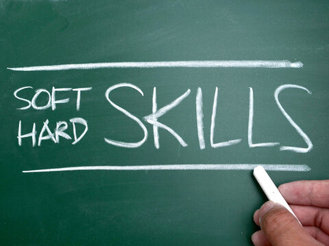Soft and hard skills, word text written on chalkboard