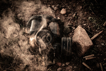 gas mask and sten gun 