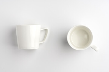 Blank white mugs mock up on white background