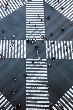 Aerial view of pedestrian crossing with people, Tokyo, Japan