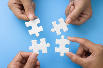  Hand of woman connecting jigsaw puzzle, Business solutions, success and strategy, Business...