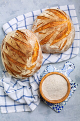 Artisanal round wheat bread with sourdough.