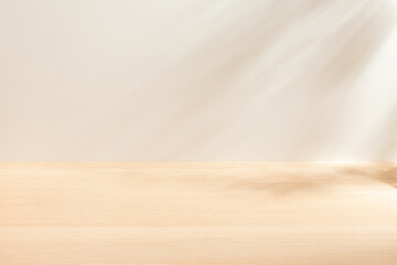 Blank warm lighting background. White and fabric surface. Light and Shadow wallpaper. Space for text. Backdrop. Studio photography. Cozy and Comfortable. Decorative. Minimalist wallpaper. Empty space.