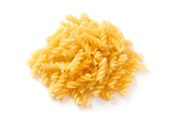 Pile of uncooked spiral pasta on a white background. Pasta isolated close-up.