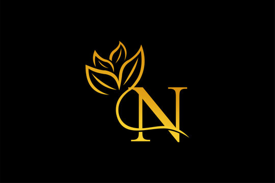 letter N logo design with luxurious gold and elegant floral ornaments. monogram N. icon N flourish. logo for business, company, boutique, salon, beauty, restaurant, brand, etc