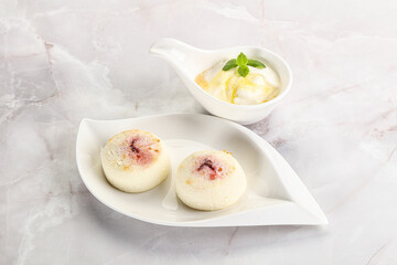 Curd pancakes with sour cream